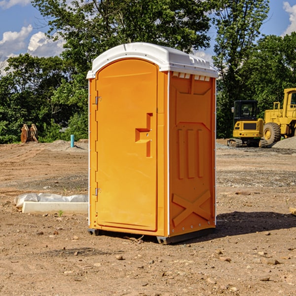 how often are the portable restrooms cleaned and serviced during a rental period in Calliham